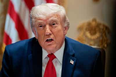 Image for Trump says talks with Iran continue
