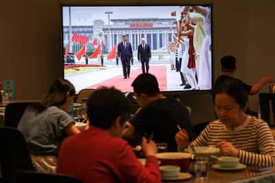 Image for Xi and Putin to dine over Peking duck, Chinese opera and Swan Lake