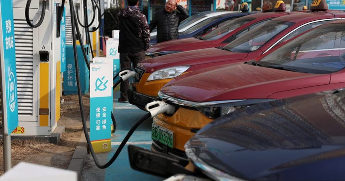 China says it will monitor EU moves on Chinese hybrid cars, opposes