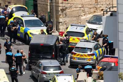 Image for Two policemen injured in Malta shooting