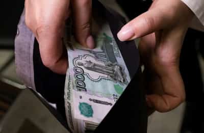 Image for Russian rouble at 110 to US dollar, down by one quarter since early August