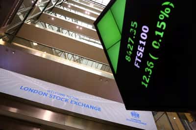 Image for Consumer stocks rally drives UK's FTSE 100 to record close