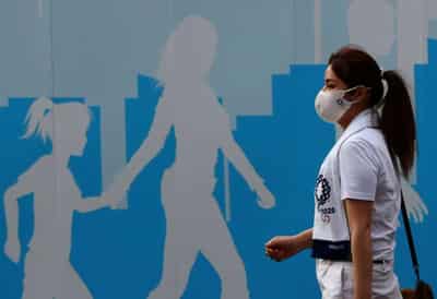 Image for Two Games attendees in hospital as Japan COVID-19 cases surge
