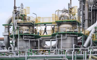 Image for German industry keeps cutting jobs despite first sales rise in three years, EY says