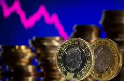 Image for Sterling hovers near one-month low ahead of US inflation print