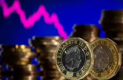 Image for Sterling hovers near one-month low ahead of US inflation print