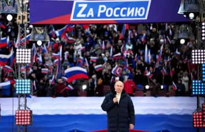Image for Putin tells mass rally that Russia will prevail in Ukraine