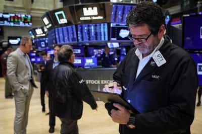 Image for U.S. stocks gain, Treasury yields hit multi-year highs ahead of expected Fed rate hike