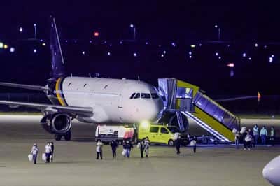 Image for Planes with hantavirus cruise passengers land in the Netherlands; hospital quarantines 12