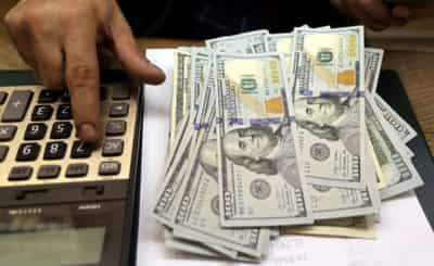 Image for Dollar trades near two-week low as U.S. yields fall