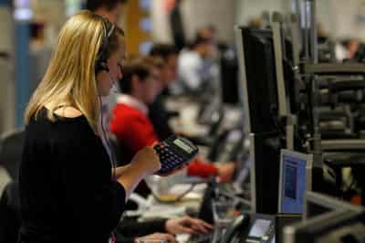 Image for London’s FTSE 100 hits fresh record high as telecoms surge