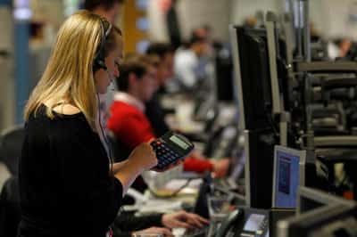 Image for London’s FTSE 100 hits fresh record high as telecoms surge
