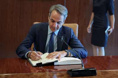 Image for Greece to deploy frigates off Libya to curb increased migrant flows, PM says