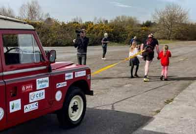 Image for Former British soldier sets off for 100 km charity walk, pulling a Land Rover