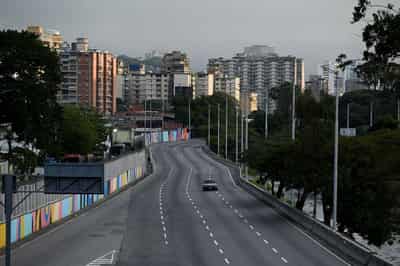 Image for Shocked Venezuelans hunker down, unsure of what comes next