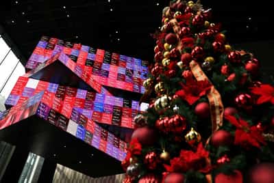 Image for Festive cheer takes hold of world stocks, yen lifted by FX warning