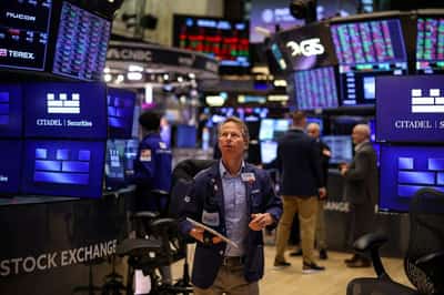 Image for Global shares and dollar higher as markets eye Fed rate cuts