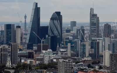 Image for UK services firms report slower growth and weaker inflation, PMI shows