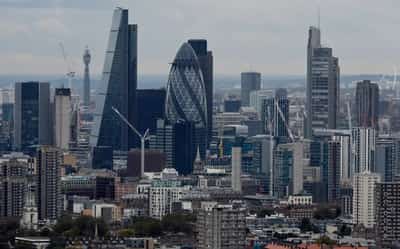 Image for UK services firms report slower growth and weaker inflation, PMI shows