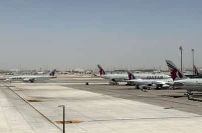 Image for From handwashed underwear to fake Adidas, stranded travellers wait out travel chaos