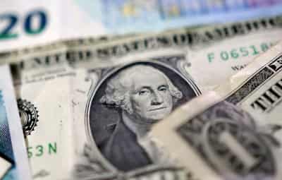 Image for Dollar steady as markets brace for busy central bank week amid Mideast war