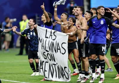 Image for Soccer-Argentine players brandish political Falklands flag after England match