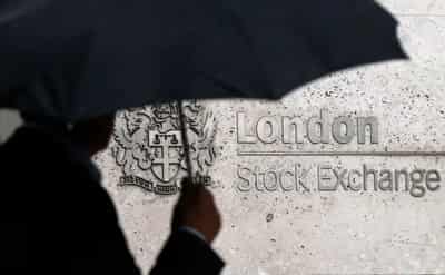 Image for UK’s FTSE 100 slips on utilities losses; indexes set for weekly gains