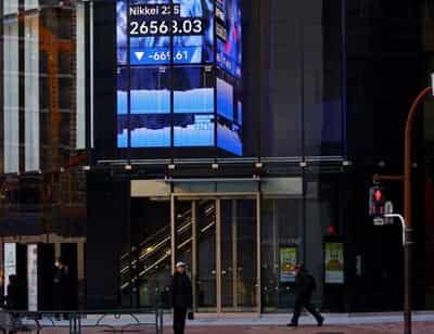 Image for Stocks, dollar pause ahead of Powell, Biden speeches
