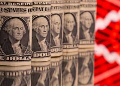 Image for Dollar index edges up on upbeat data; virus worries linger