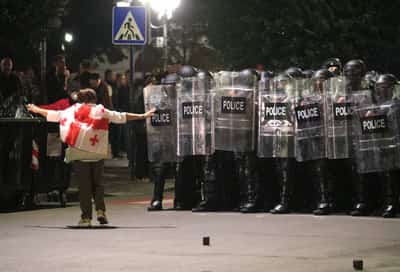 Image for Georgian police clash, detain protesters as ruling party says it won local elections