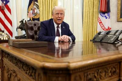 Image for Trump says he will announce reciprocal tariffs on many countries next week