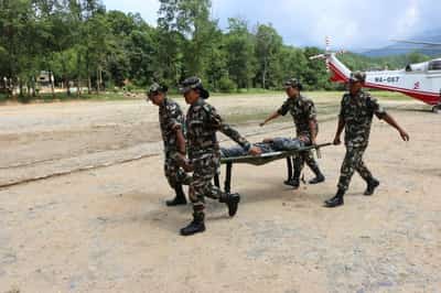 Image for Rescuers scour Nepal flood debris as risk of fresh flooding grows