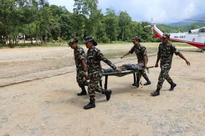 Image for Rescuers scour Nepal flood debris as risk of fresh flooding grows