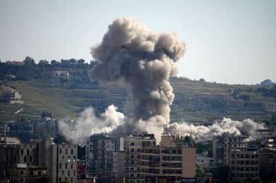 Image for US says it struck Iranian military sites, Tehran responds with air base attack