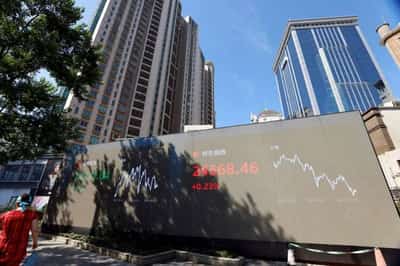Image for U.S. stocks gain, oil dips as NATO meets on Ukraine