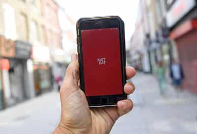 Image for Just Eat Takeaway raises 2023 guidance, launches buyback