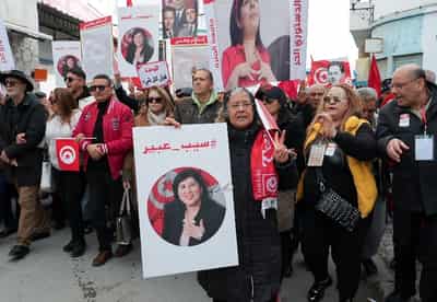 Image for Tunisians protest against Saied over arrests and economic strain