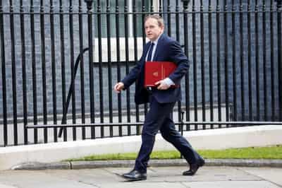 Image for UK spending to help squeezed voters would risk spiralling inflation -minister