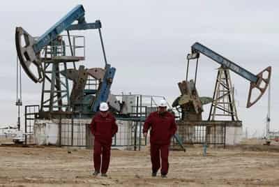 Image for Oil slips below $104 as reserves release counters supply fears