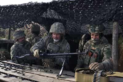Image for Ukraine says it pulled back troops from southeastern village, stopped Russian advance