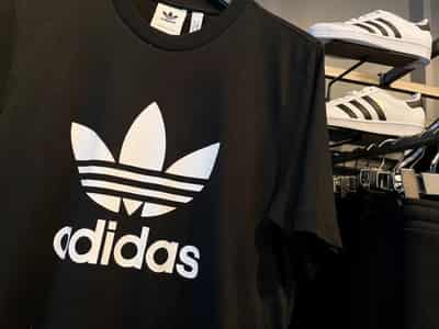 Image for Adidas posts first loss in 30 years but sticks to dividend