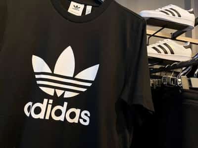 Image for Adidas posts first loss in 30 years but sticks to dividend