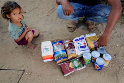 Image for Israel bars some aid workers from Gaza as groups face suspension