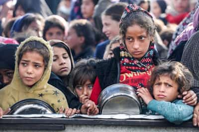 Image for 'Our children are dying slowly' says father searching for food in Gaza