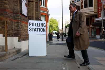 Image for UK voters cast ballots in elections expected to deal blow to Starmer