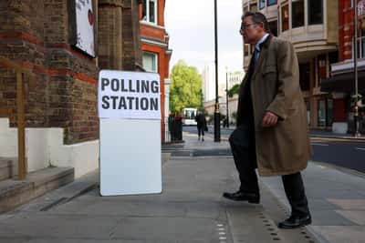 Image for UK voters cast ballots in elections expected to deal blow to Starmer