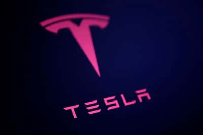 Image for Tesla's supervised self-driving system often misreads speed limits, Belgian safety group finds