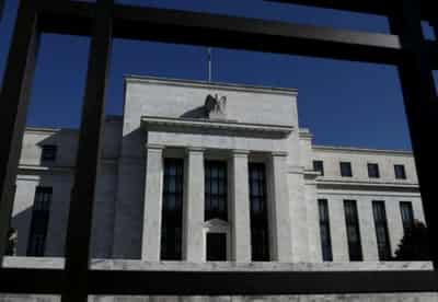 Image for Fed signals rate hikes for 2023, start of bond-buying taper talks