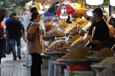 Image for Iranians stagger under soaring costs of seven months of war