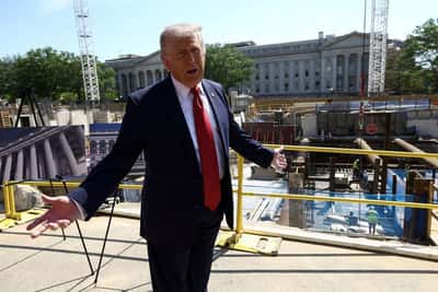 Image for Trump talks up his ballroom plan dozens of times but plays down Americans' economic pain